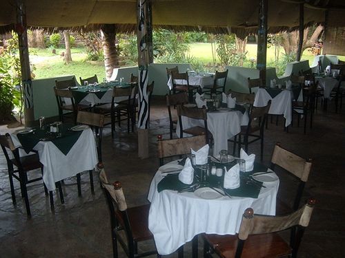L Oasis Lodge And Restaurant Arusha Bagian luar foto